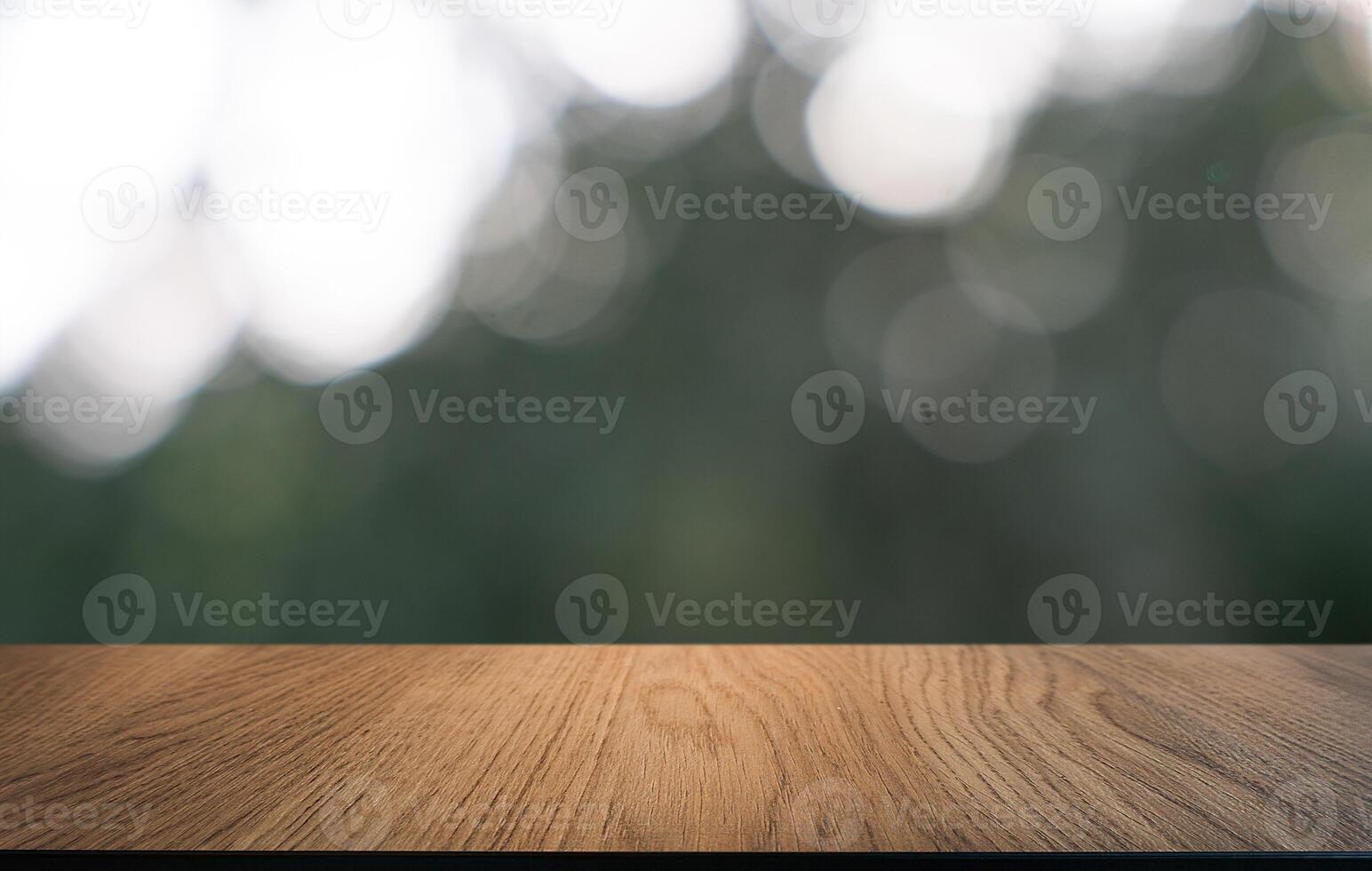 empty wooden table top with blurred background. photo