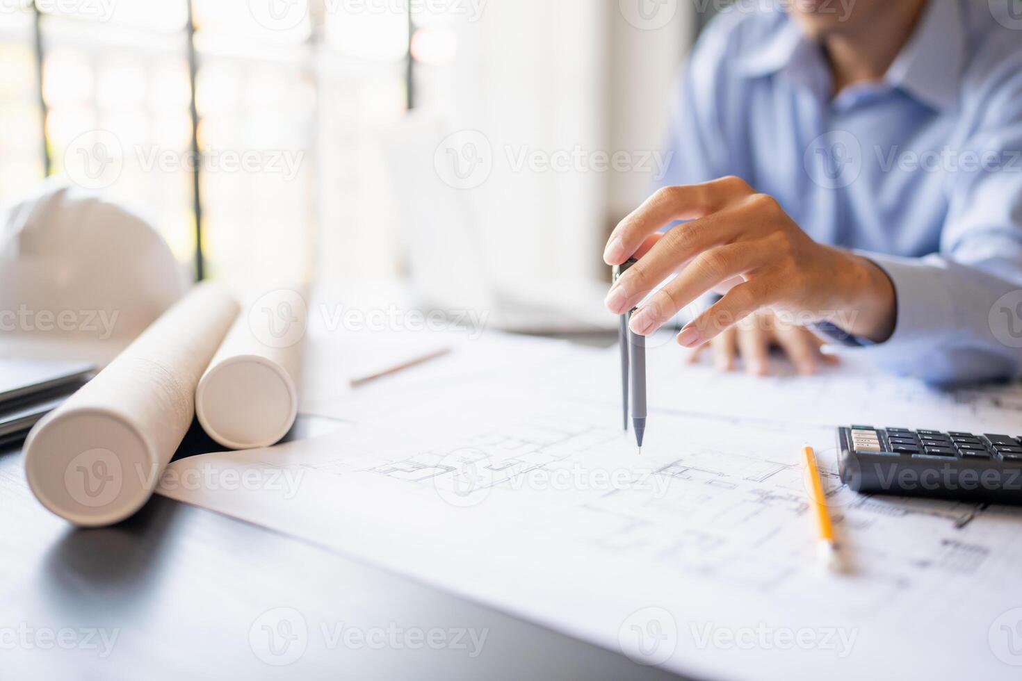 Architecture Man drawing on architectural Creative project business architecture building construction Industrial engineering Planning. photo