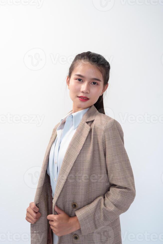 Beautiful asian young business woman in suit and blouse. photo