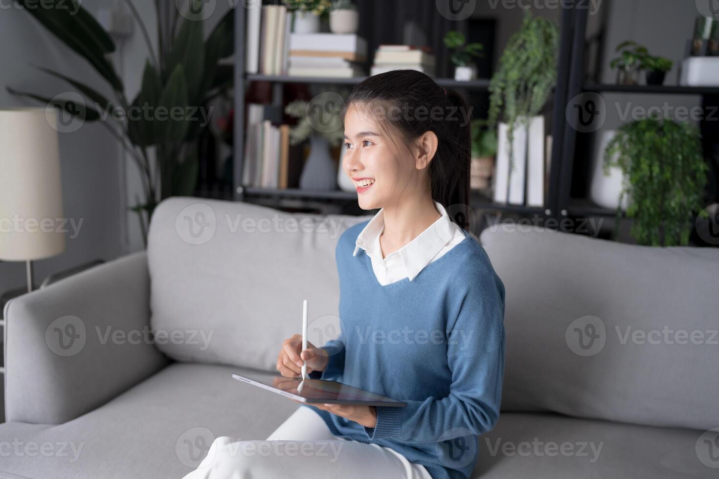 Asian woman Graphic designer working on digital tablet. artist drawing on graphic tablet female Artist Creative Designer sketch graphic drawing creative studying work on tablet photo