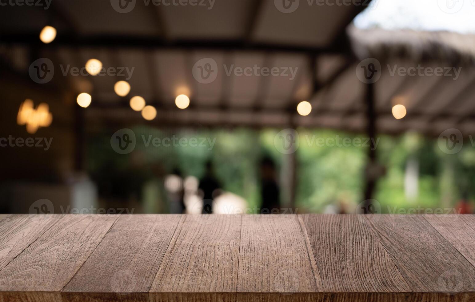 wooden table top with blurred background. photo