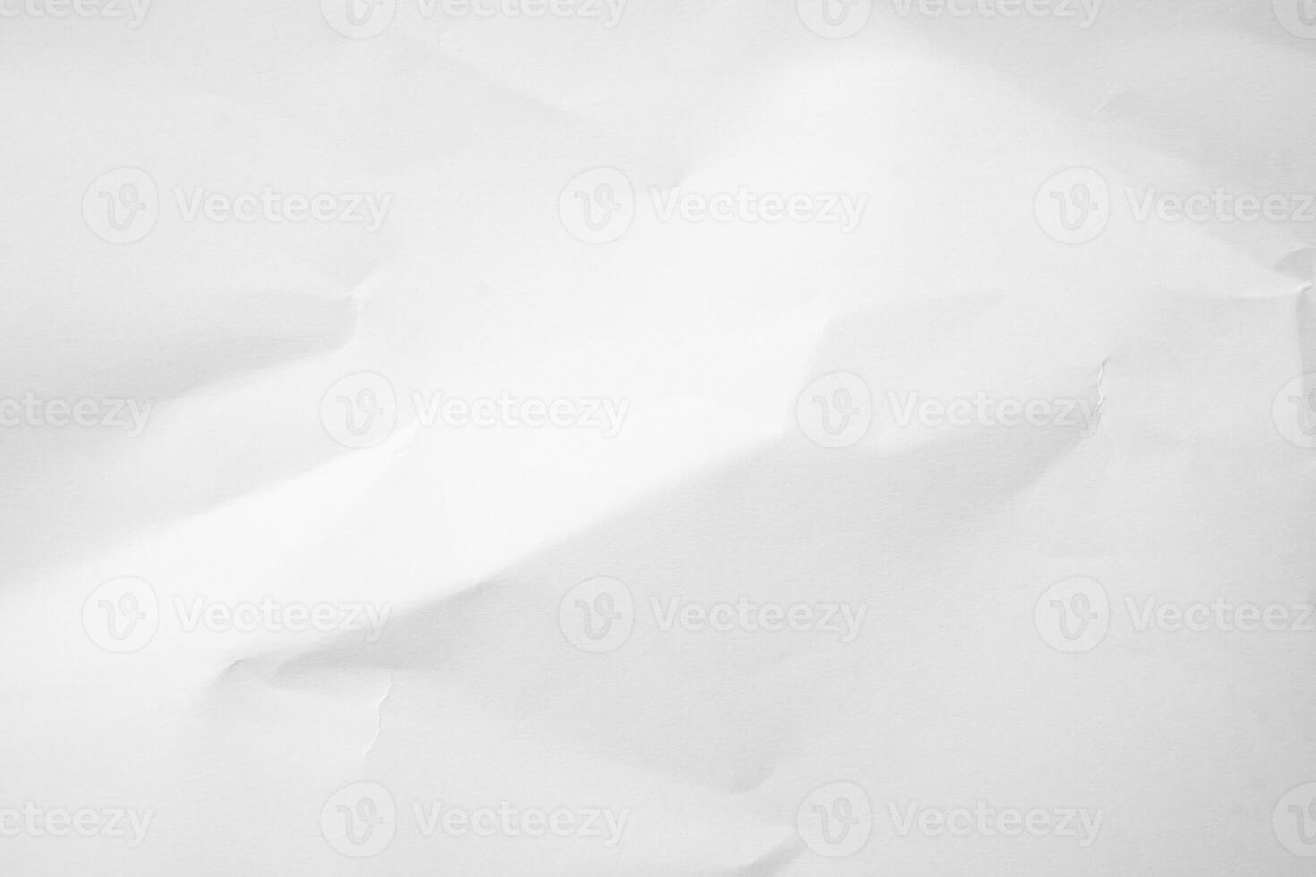 white paper background crumpled edges. photo