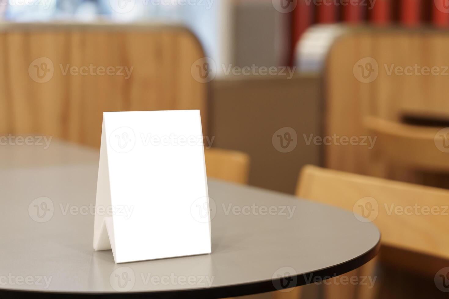 a table with a Menu mock up blank on it sitting in a restaurant photo