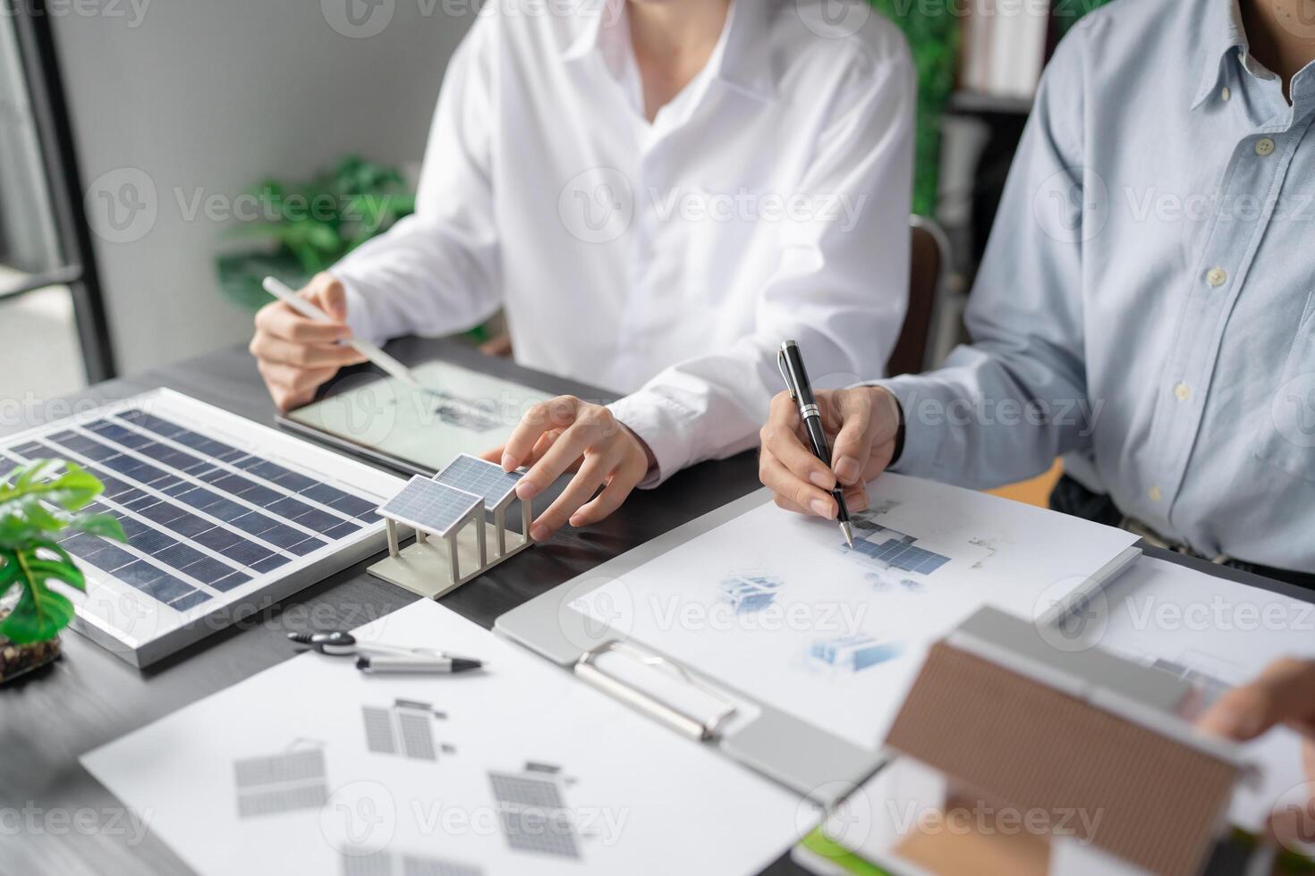 Solar panels green energy, Business man working green eco friendly office business creative idea Planing Bio economy for business eco friendly sustainable electricity photo