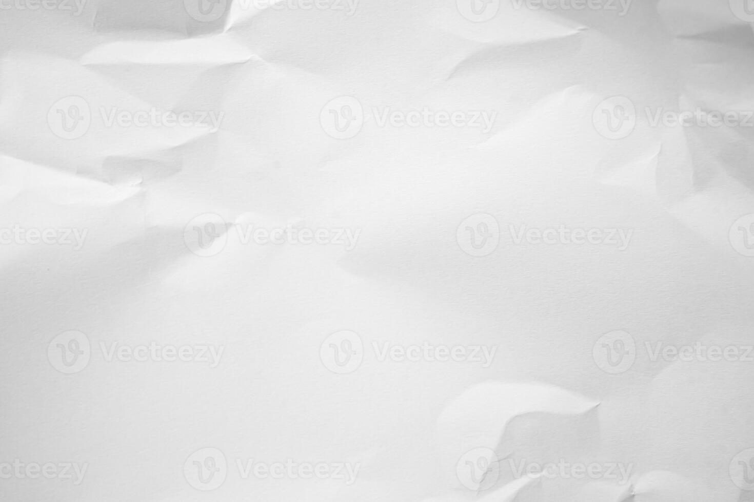 white paper crumpled up with a few pieces of paper photo