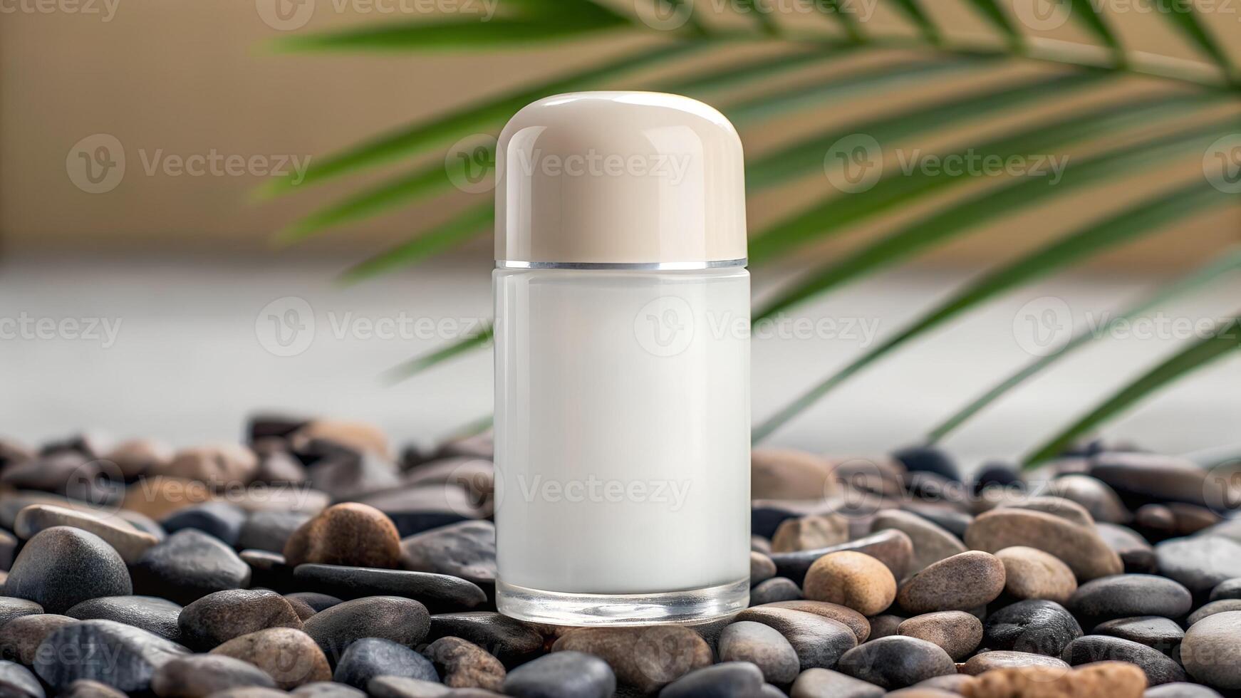 A bottle of cream sits on a stone surface photo