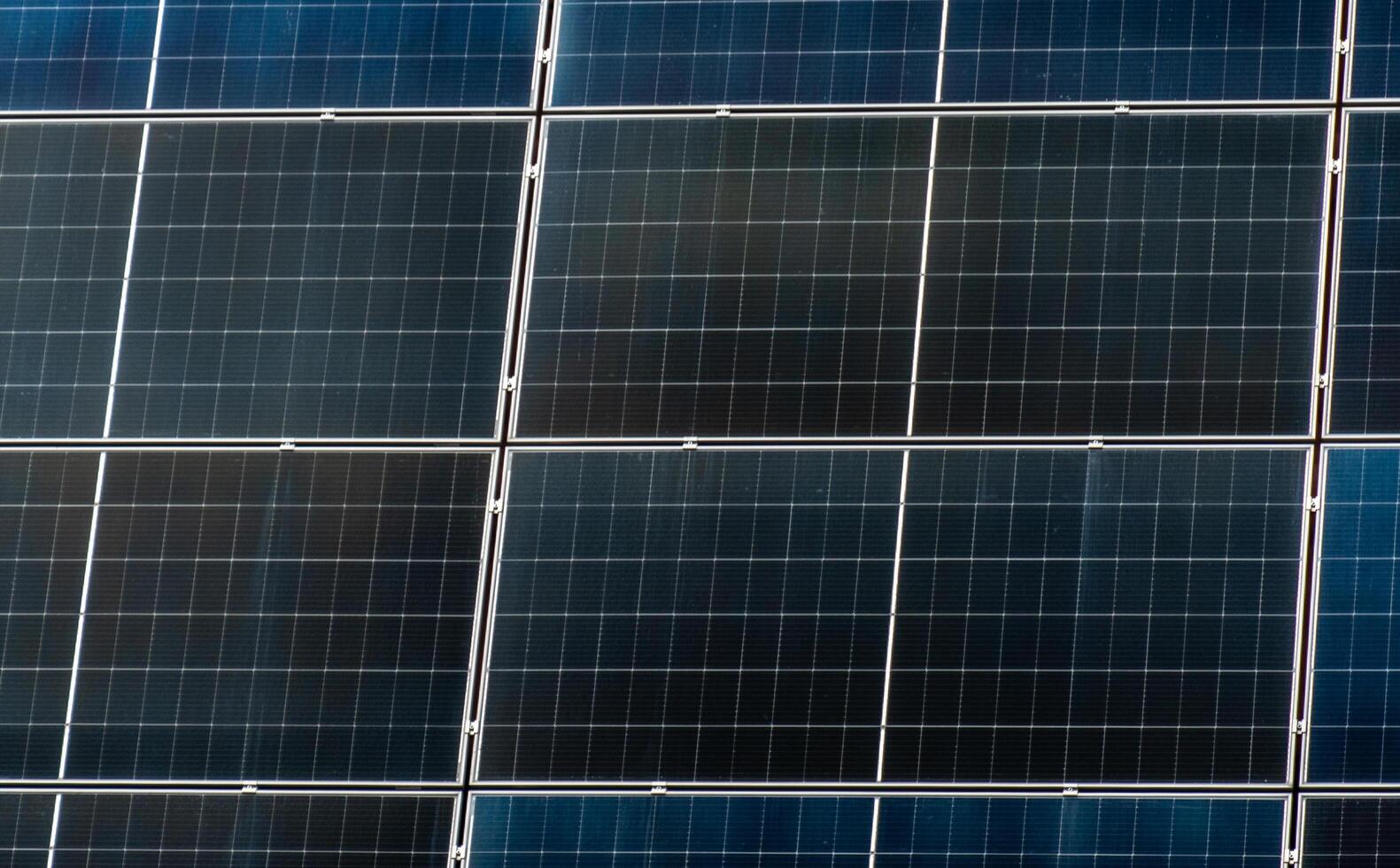 Close-up view displaying solar panels arranged in a grid-like structure, showcasing sustainable energy production technology photo