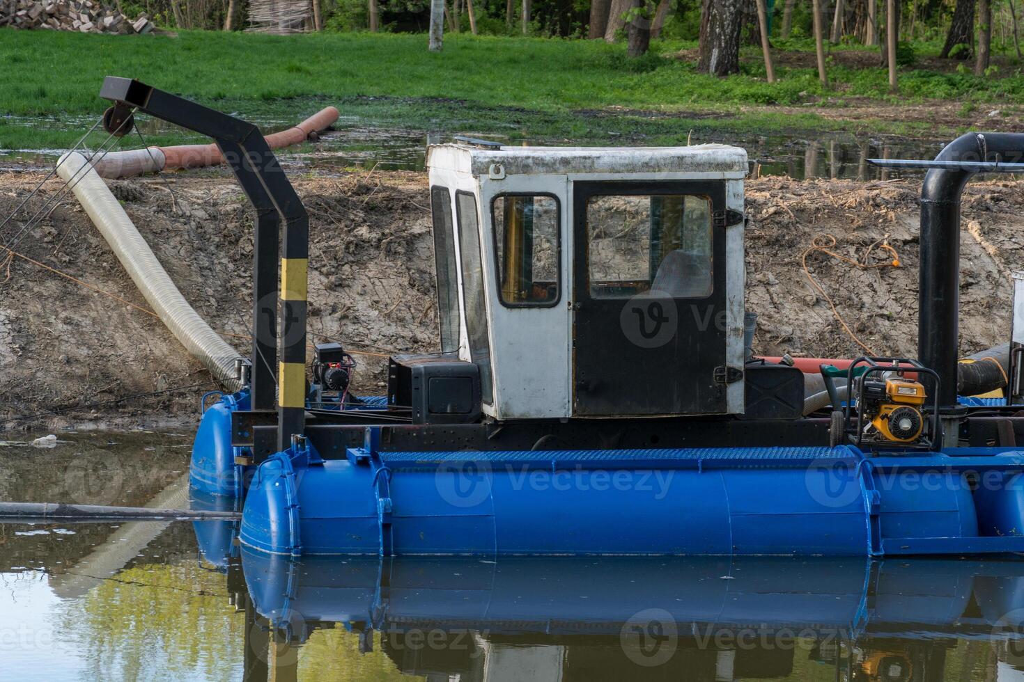 Dredging Machine in a Wetland Environment for Sediment Removal and Waterway Maintenance photo