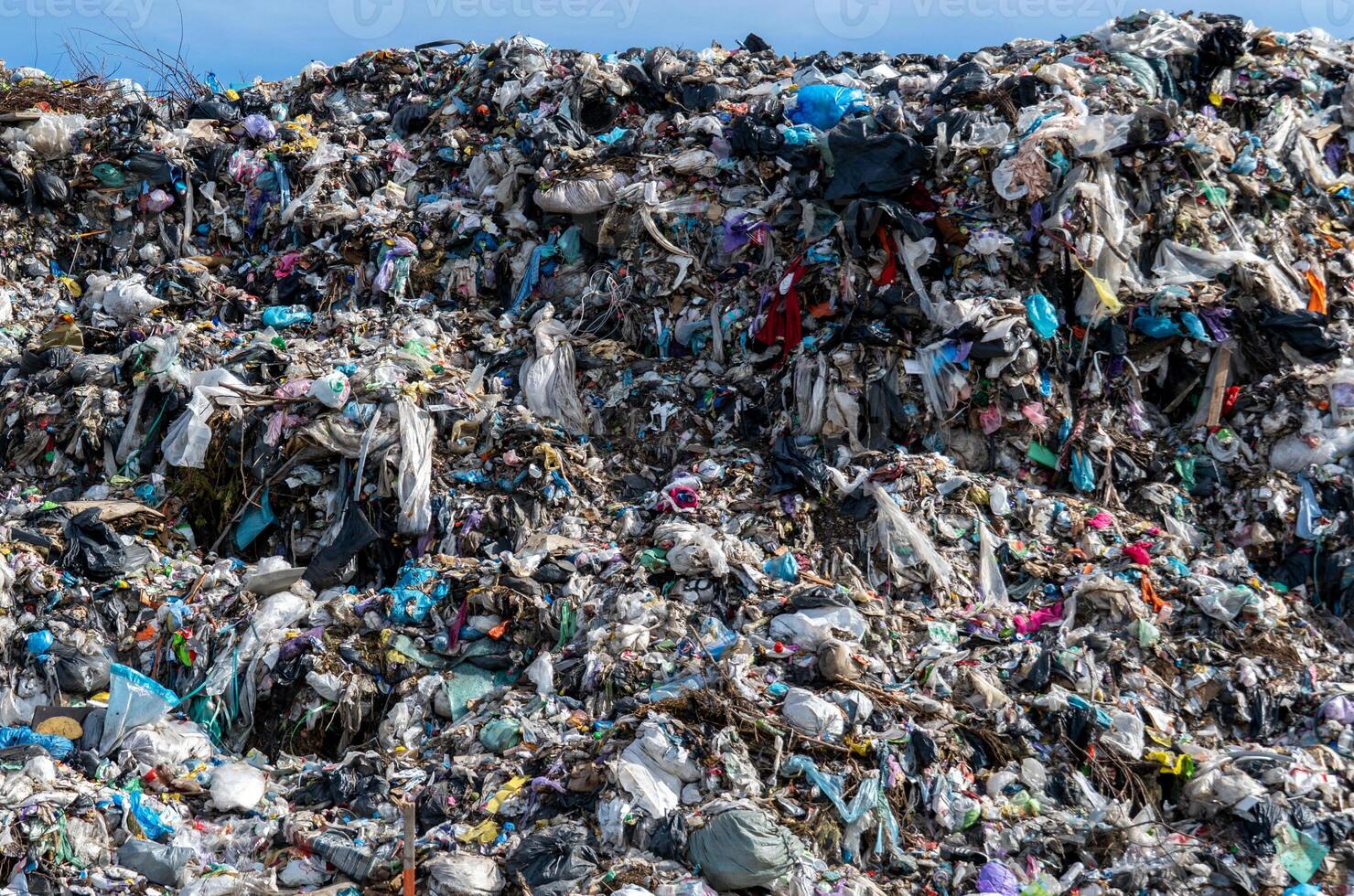 Large Landfill Pile Showing Discarded Waste and Trash Accumulation photo