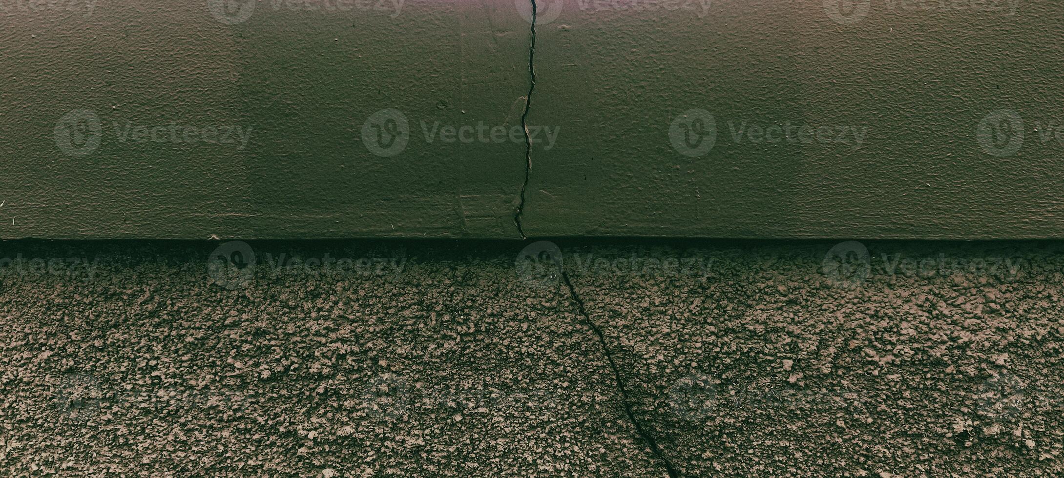 Textured Surface with a Vertical Crack, Abstract Composition and Dark Tones photo