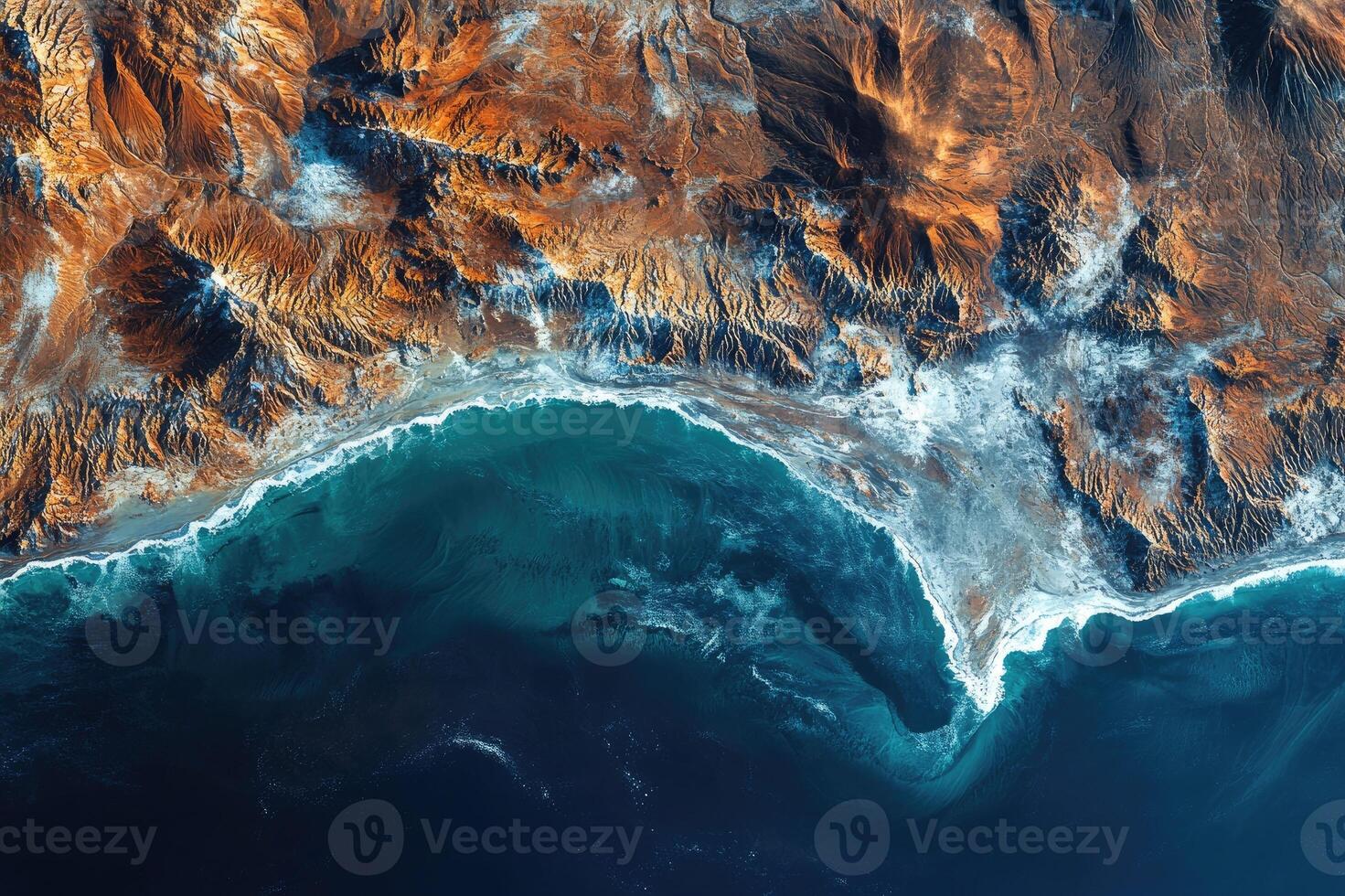 Ocean waves crashing on rocky coastline, scenic aerial view of nature's power photo