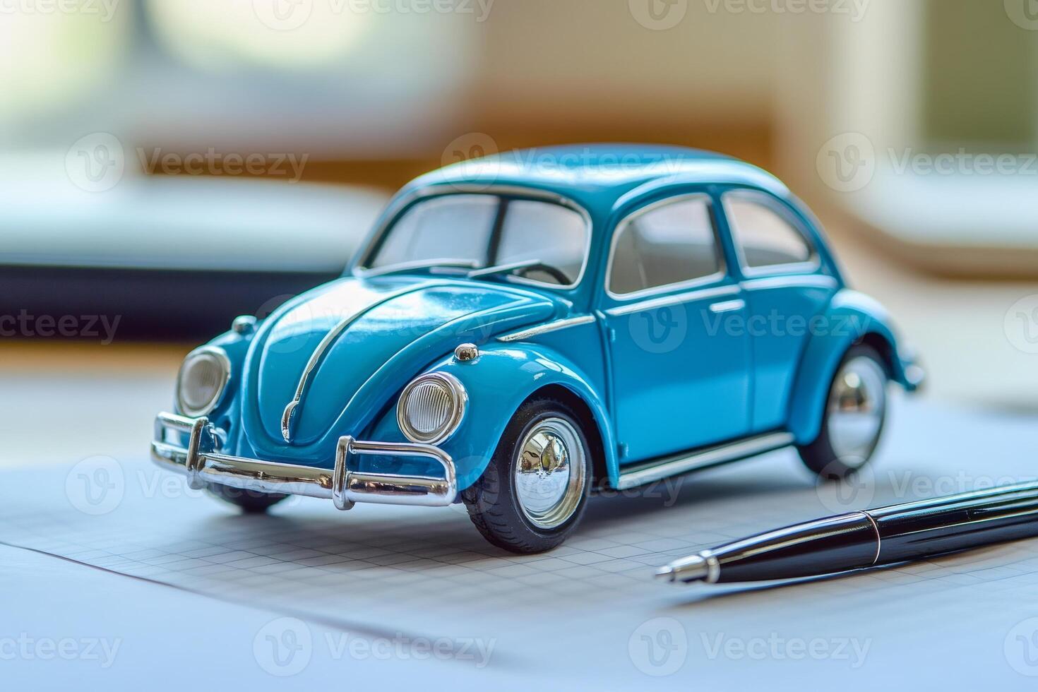 Blue toy car representing car insurance policy signing photo