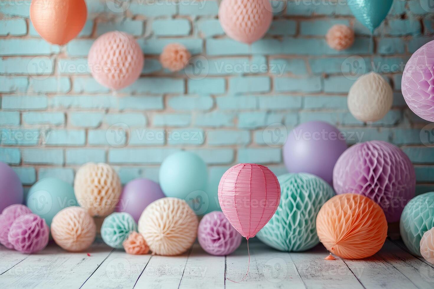 Pastel colored balloons and honeycomb balls creating festive atmosphere photo