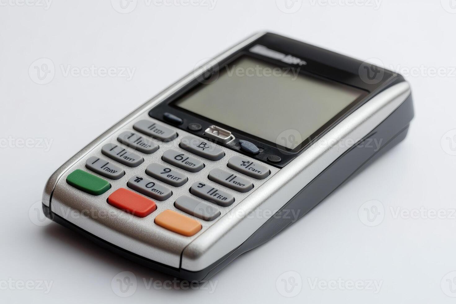 Modern credit card reader lying on a white desk photo
