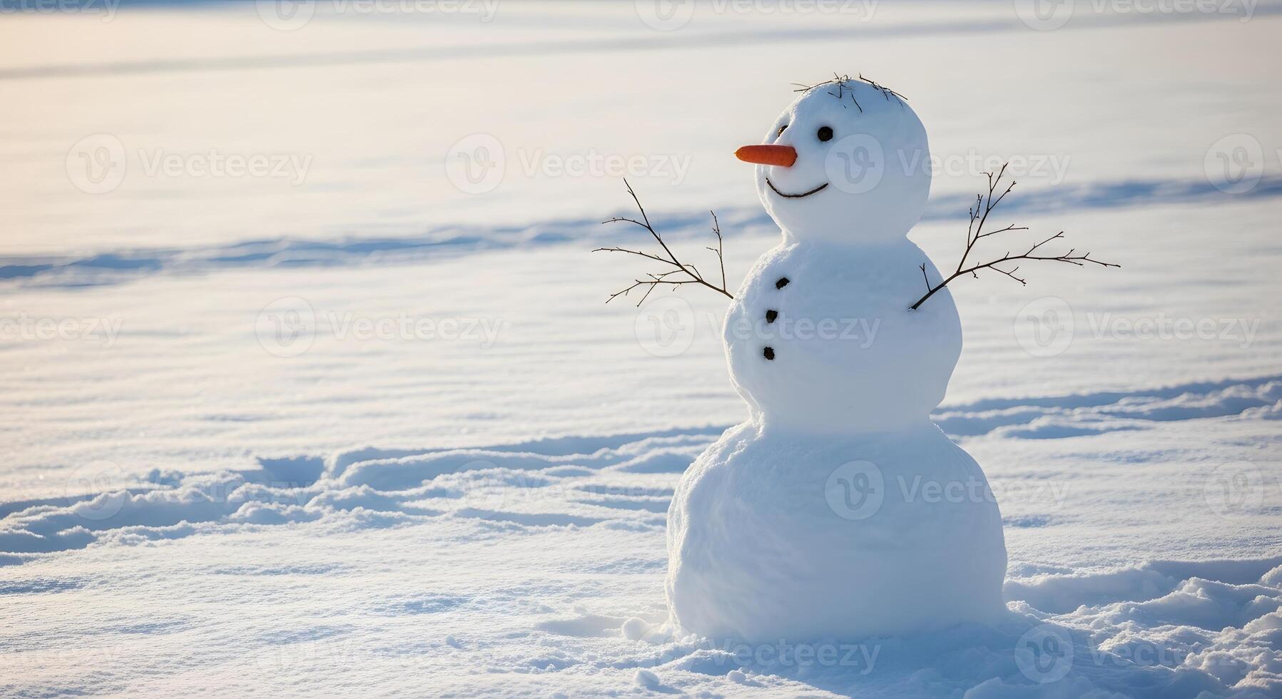 Single snowman in bright sunlight on snowy field photo