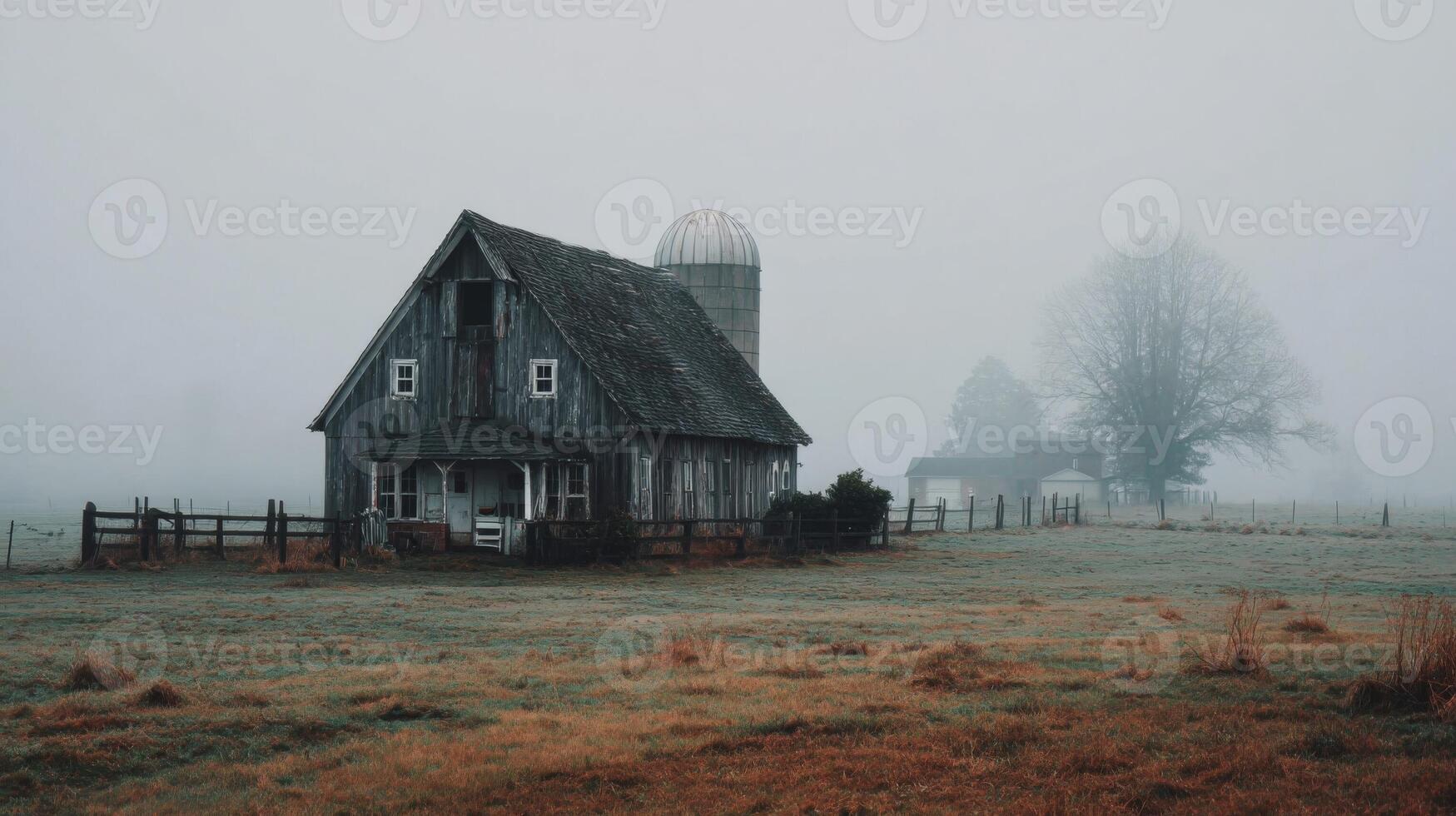 Old Gray Barn in a Foggy Field photo