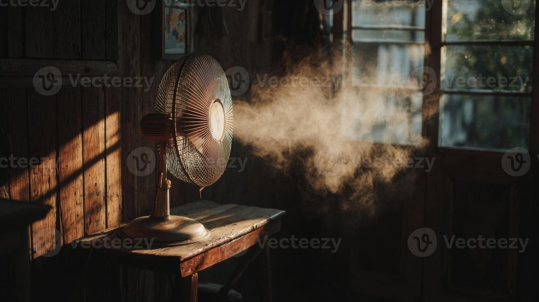 Vintage Fan in Dusty Room with Sunlight photo