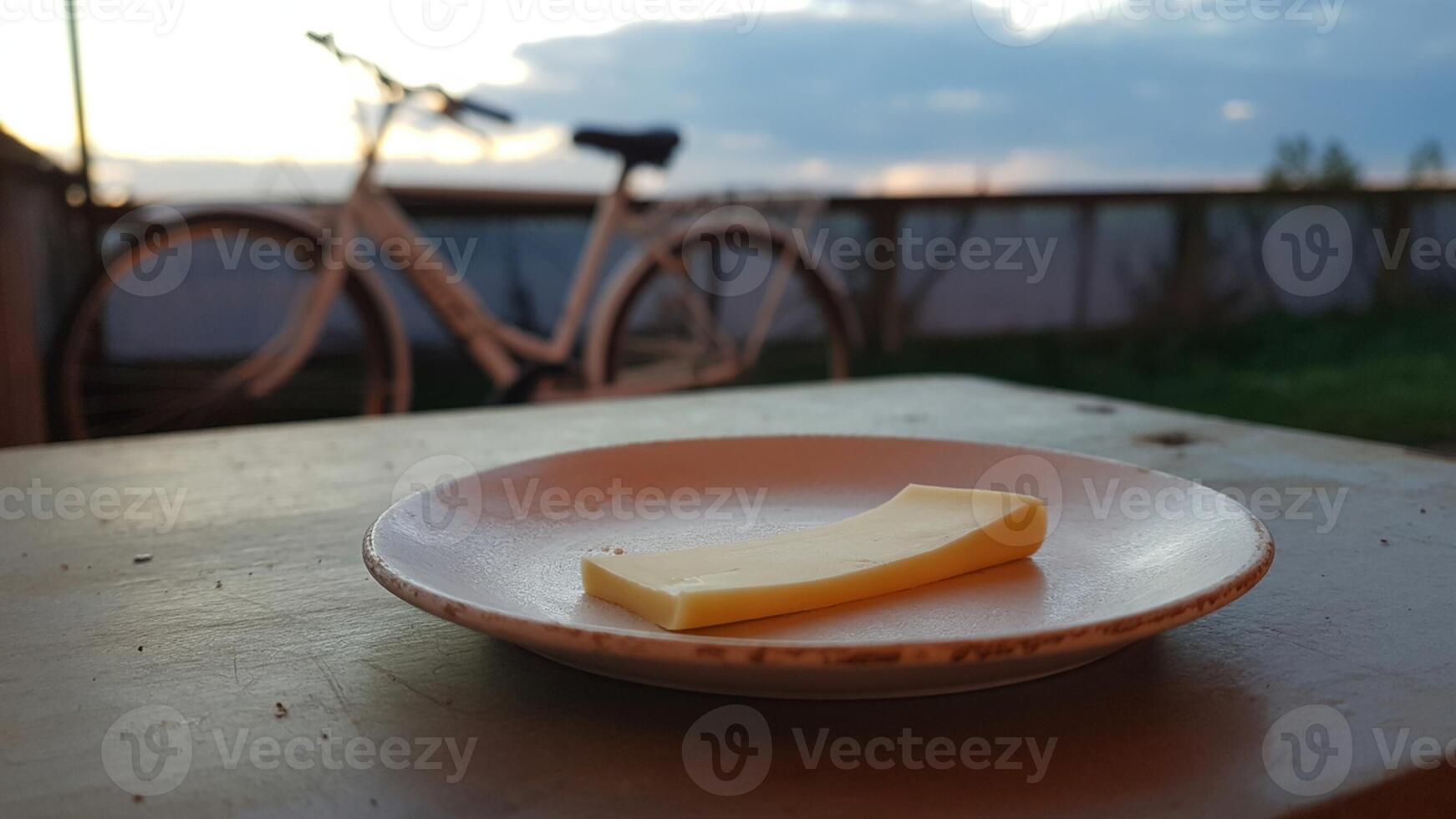 A piece of butter on a plate photo