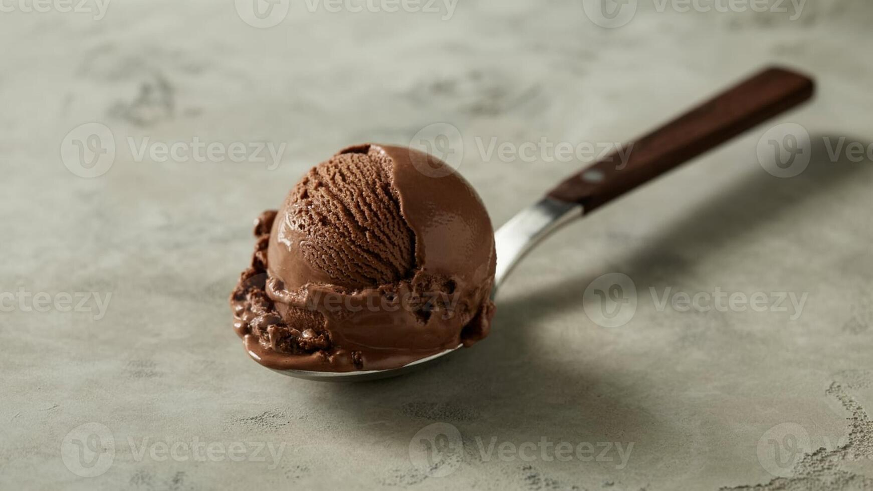 Close up of a bowl with grilled mea t, noodles, vegeta bles a nd dipping sa uce on a textured surfa ce photo