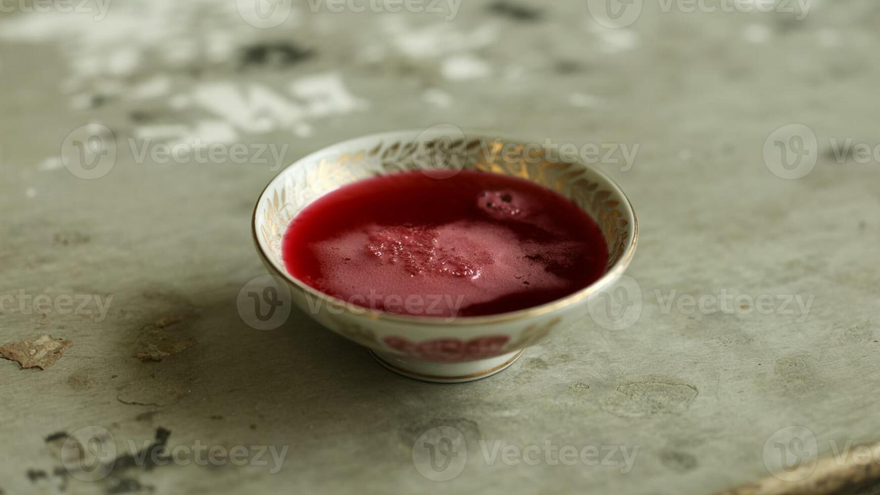 a pla te of polenta topped with toma to sa uce cheese a nd mea t served in a kitchen environment indoors photo