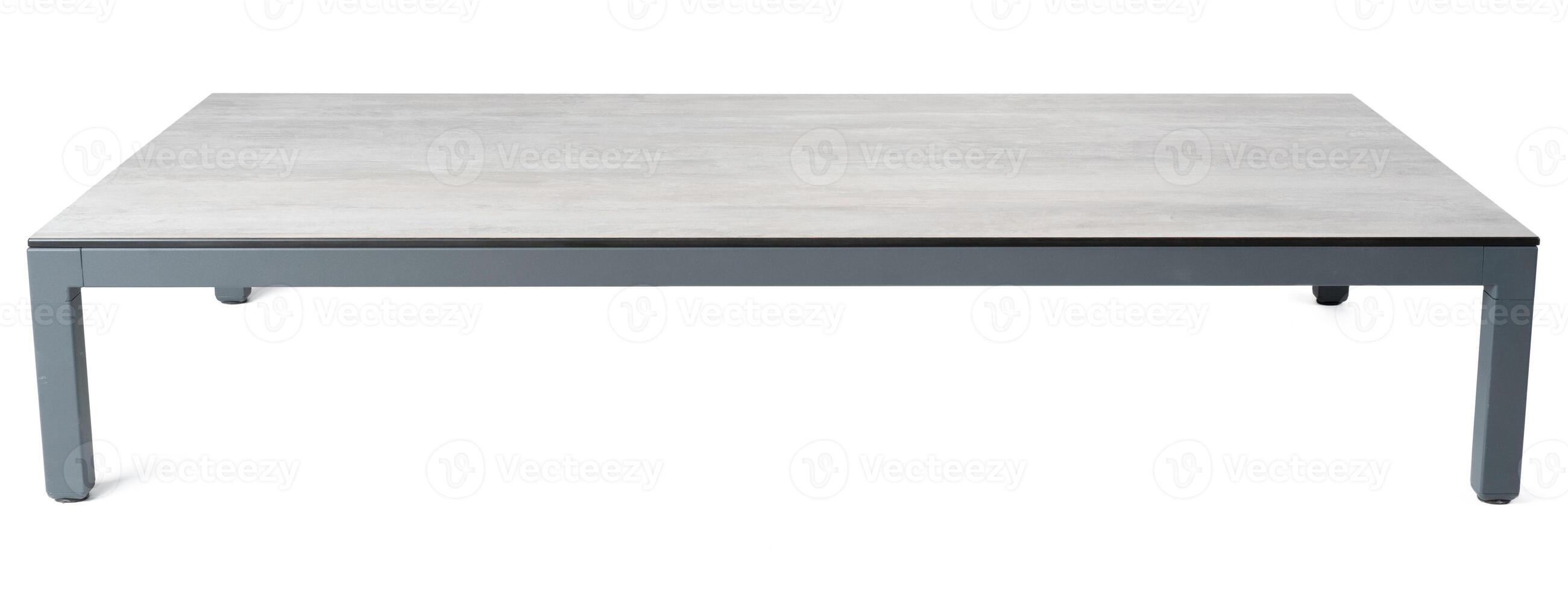 Big square table on white background close up photo