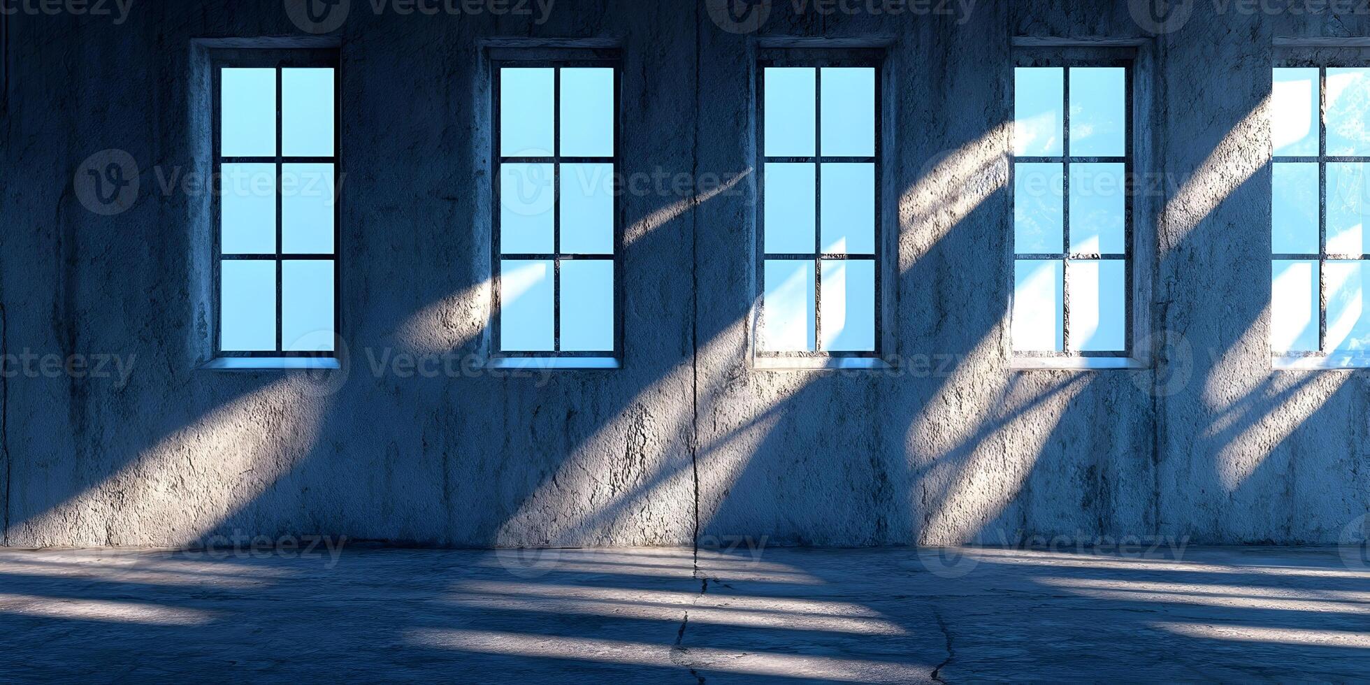 an empty room with windows and sunlight photo