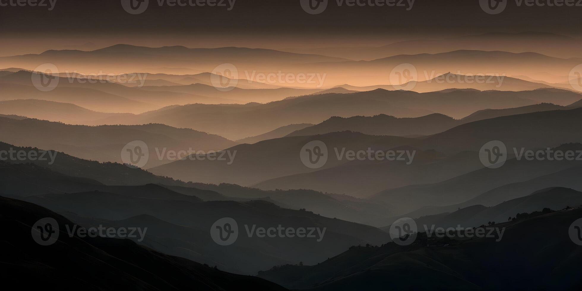 the sun is shining on a mountain range photo