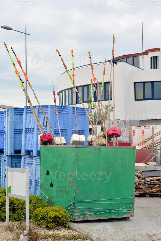 Fishing rods in a container photo