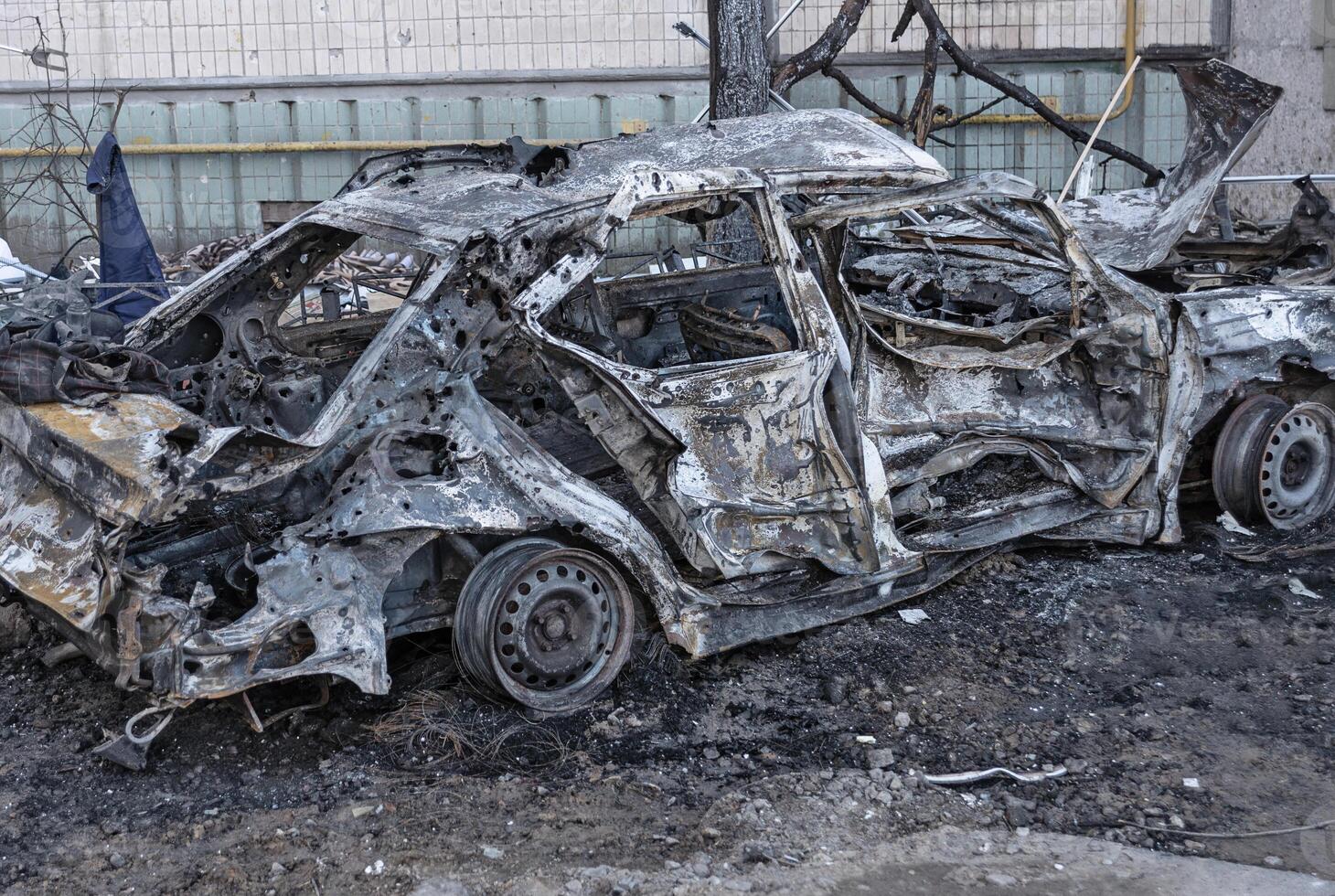 Car wrecked by shelling photo
