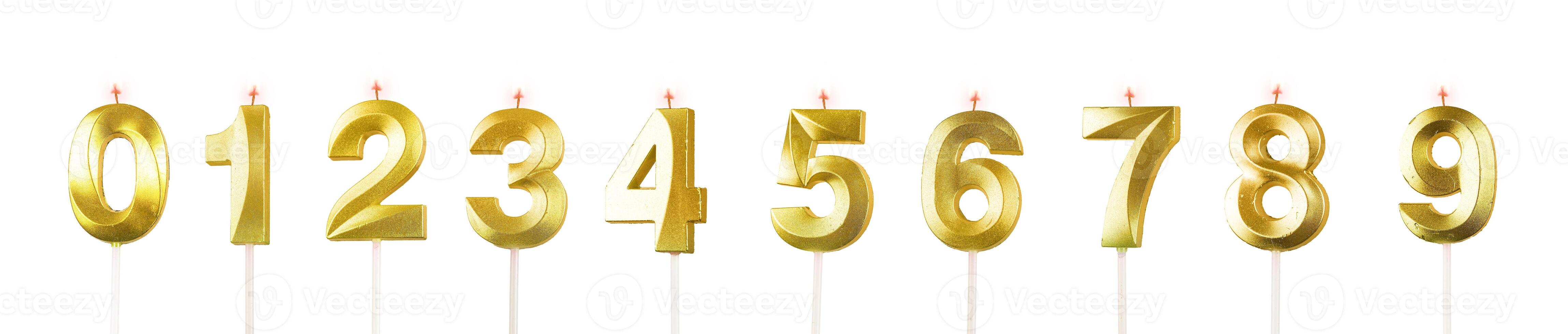 Candle set for anniversary celebration. Golden wax candles with numbers 0, 1 to 9, perfect for photo