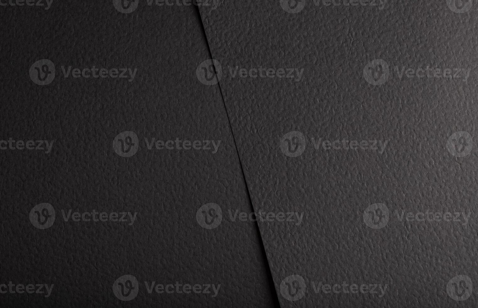 Black matte paper texture with a premium, elegant finish, featuring an abstract, geometric design. photo
