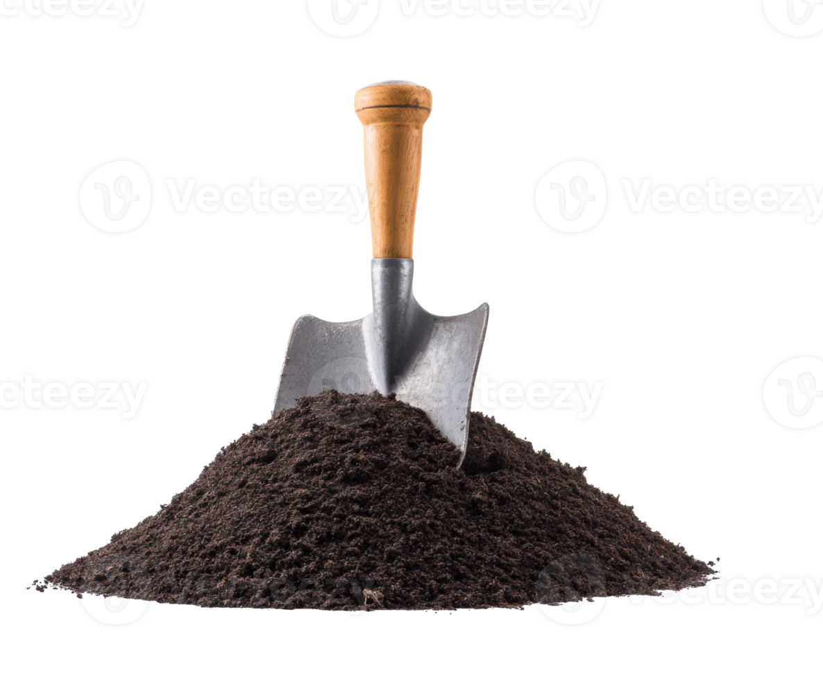 Garden shovel resting on a mound of fresh soil for planting png