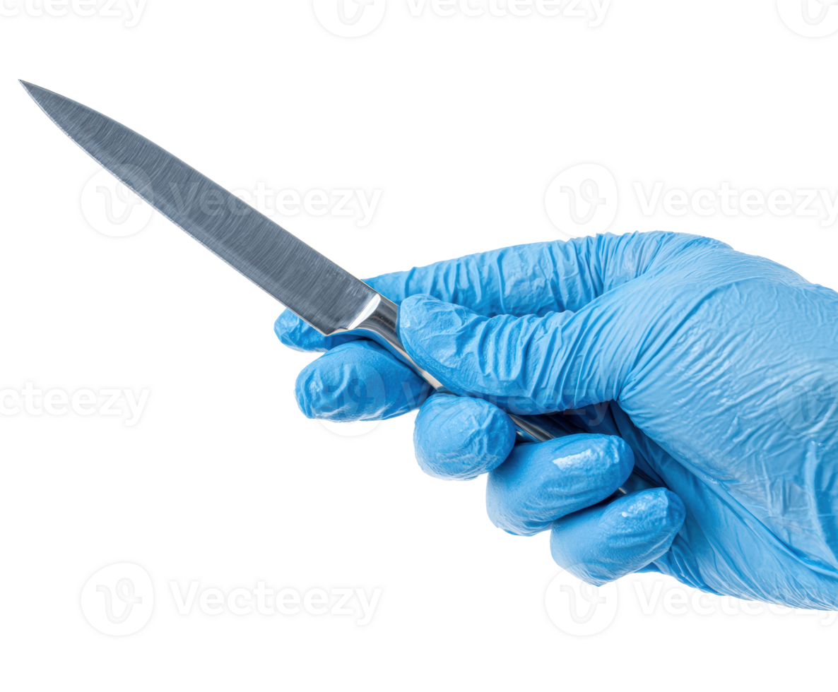 Precision culinary preparation with a gloved hand holding a knife png