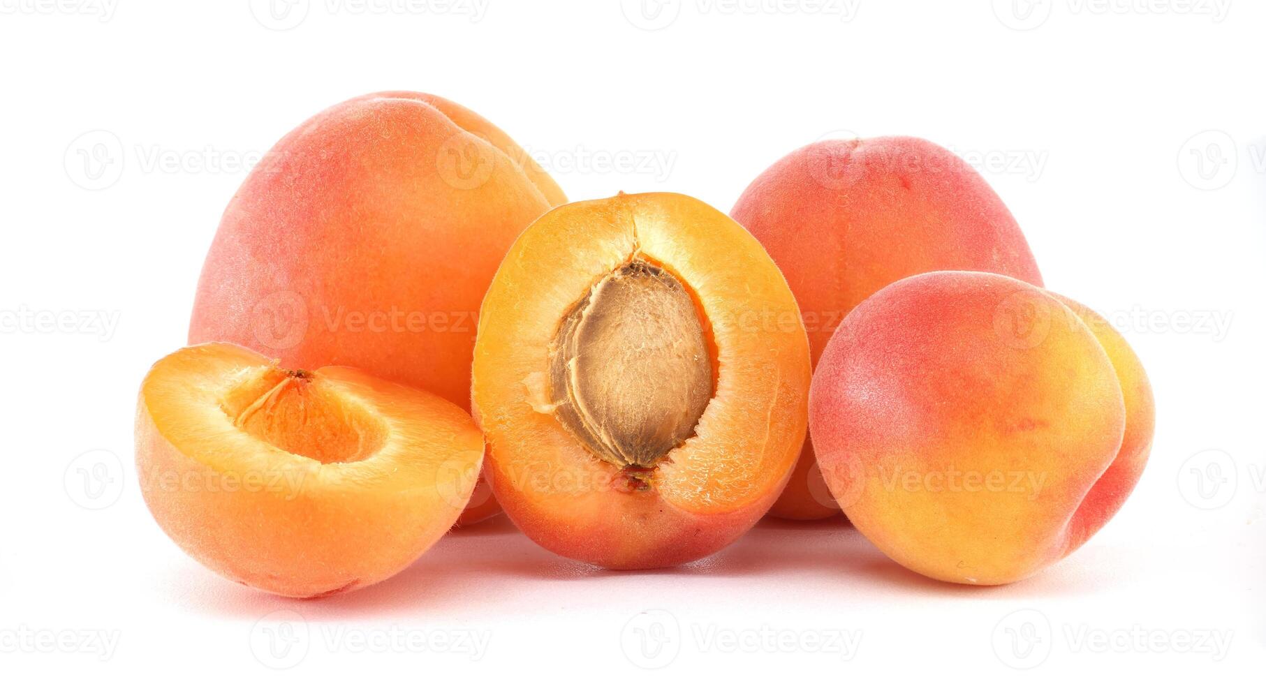 Fresh Vibrant Apricots Perfectly Displayed with Sliced and Whole Fruits photo