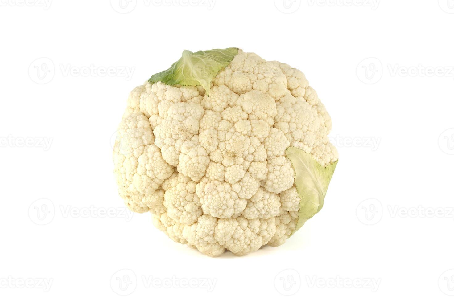 A whole, fresh cauliflower head isolated against a clean white background, ready for cooking. photo