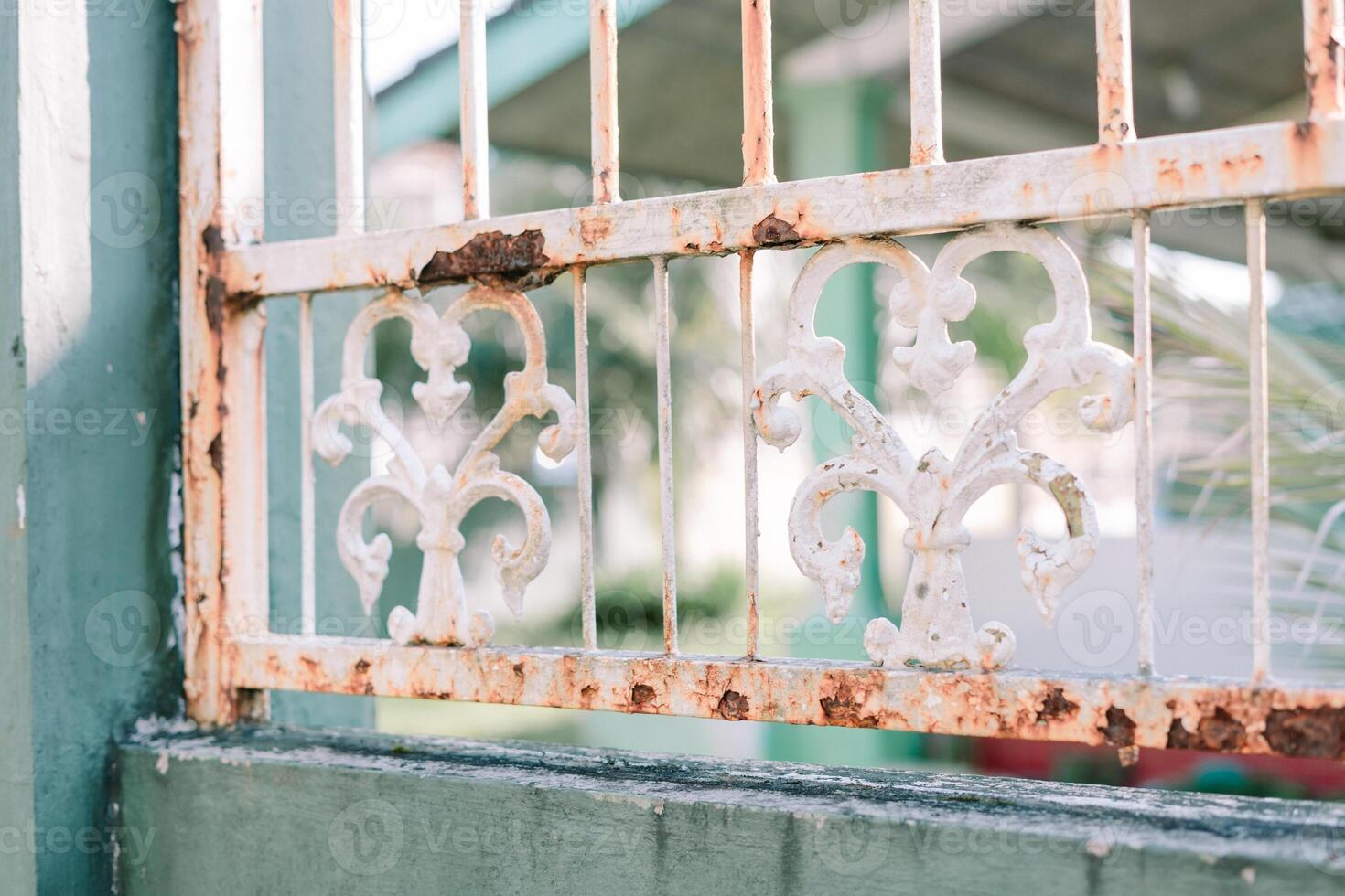Rustic charm old metal gate weathered texture with decorative elements photo