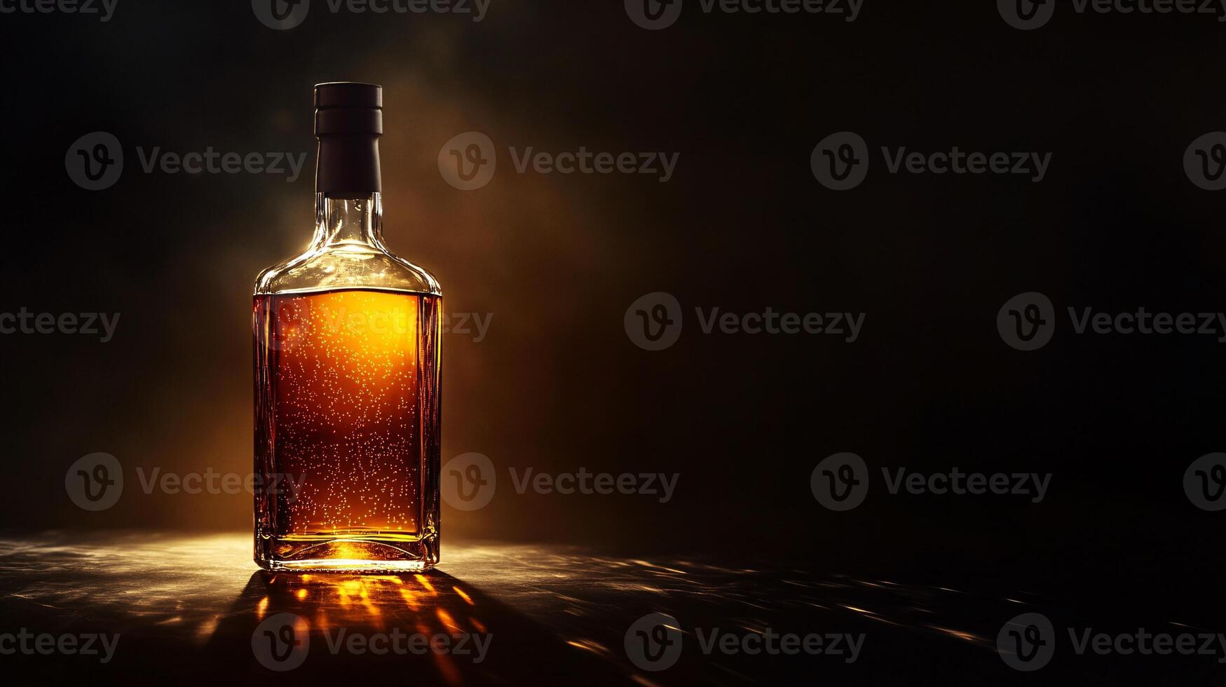 A Luxurious Whisky Bottle Displayed Against a Dark Black Background photo