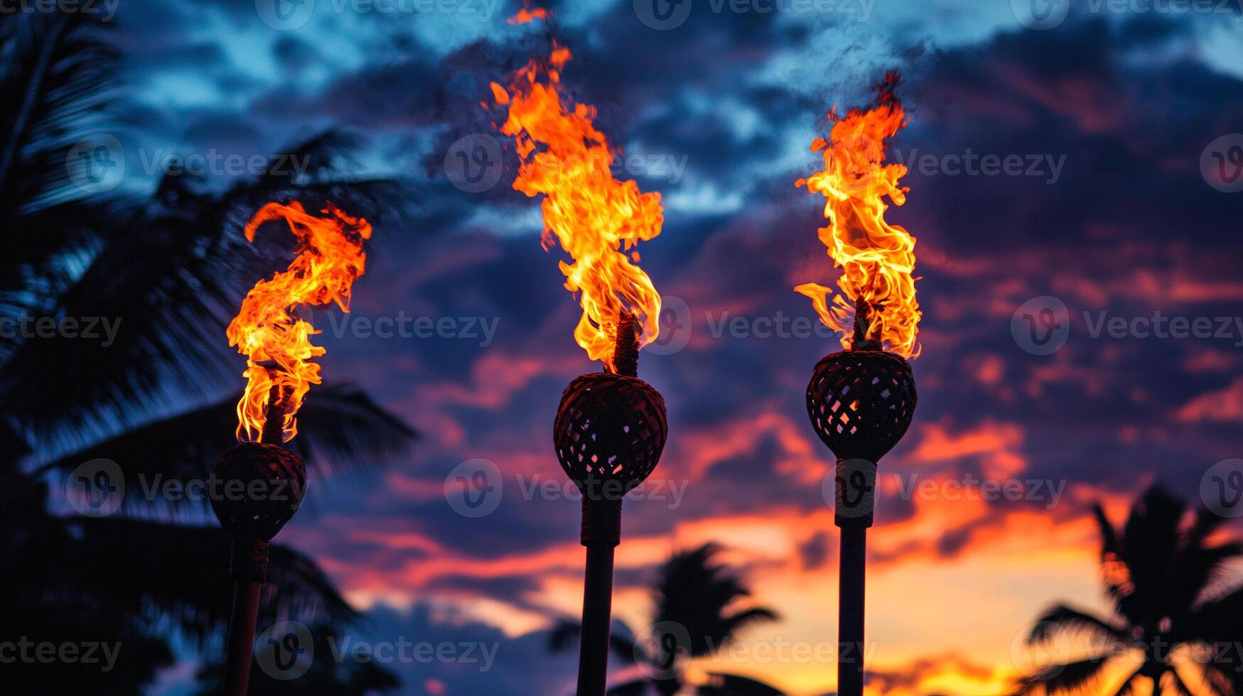 Colorful Hawaii Luau Celebration with Dancing and Tiki Torches Under Sunset Sky photo