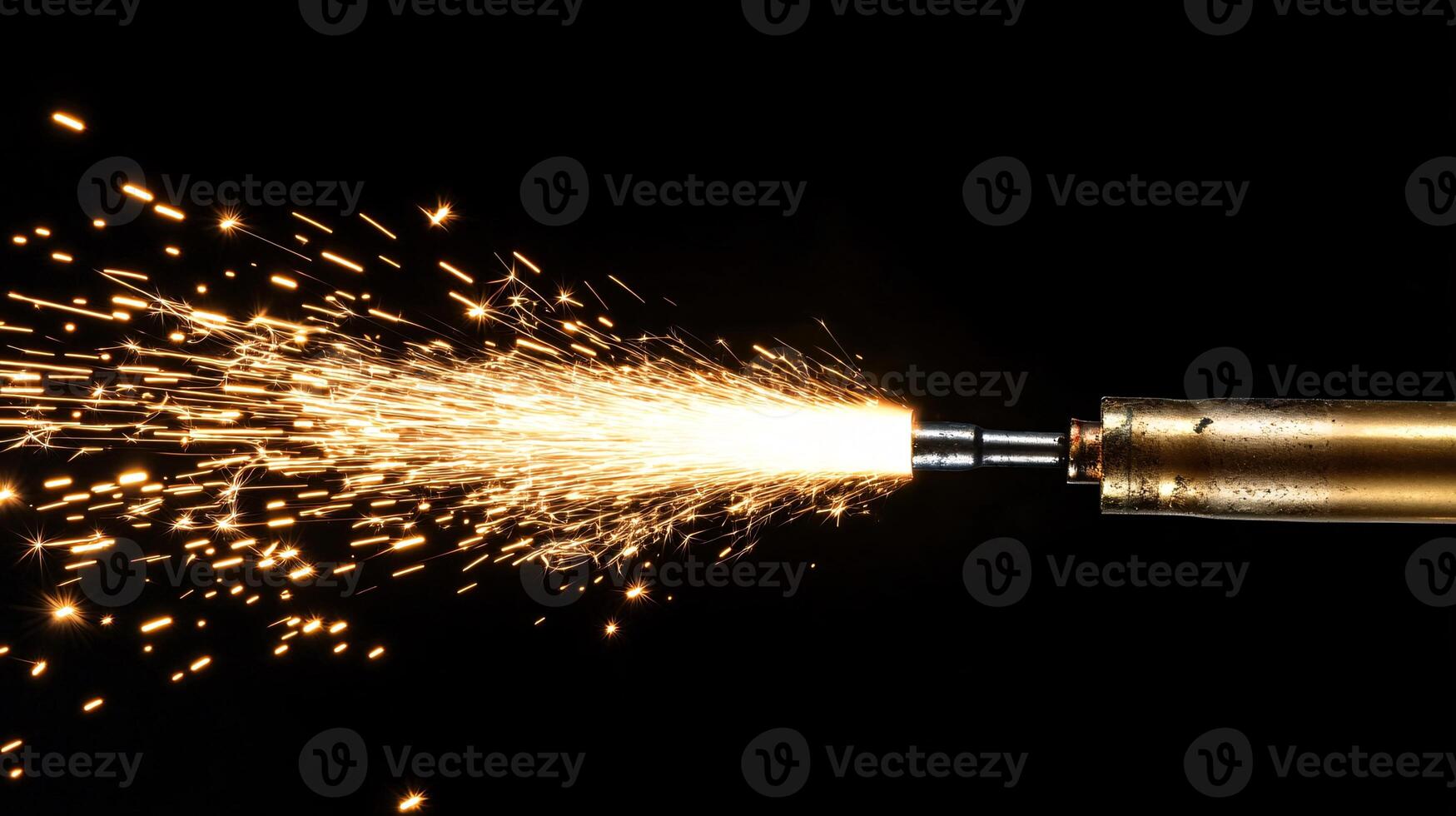 Macro Shot of Electrode Igniting, Showcasing Brightly Lit Sparks and Flame photo