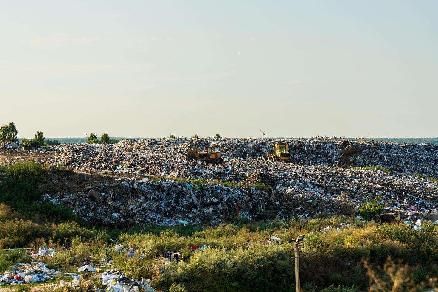 Environment pollution. A large accumulation of garbage. Garbage pile in trash dump or landfill photo