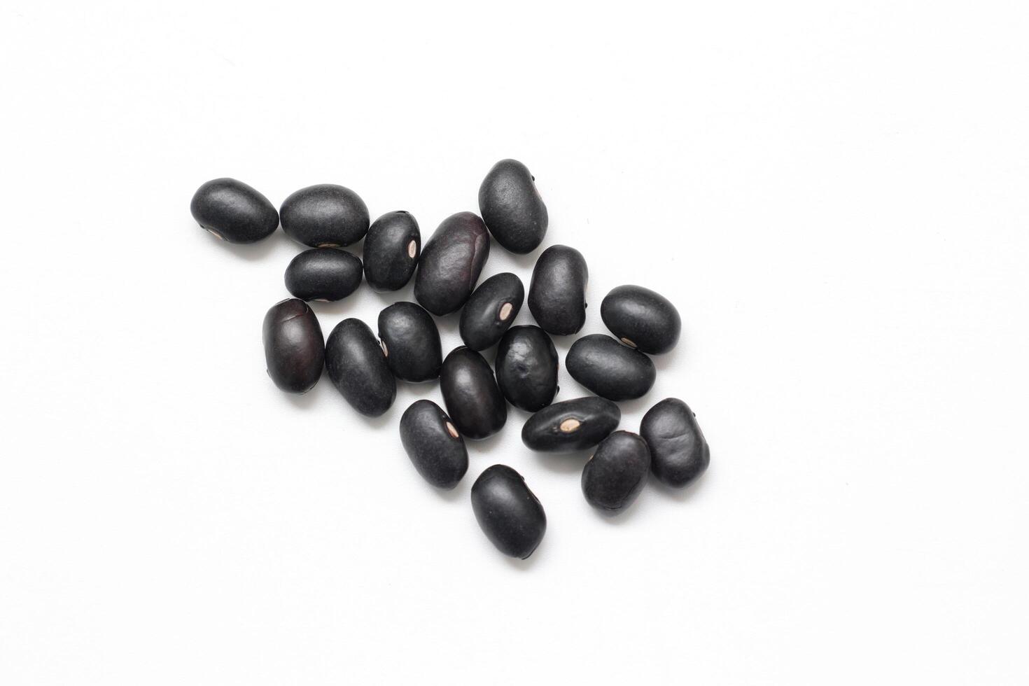 black beans on white background, isolated of black beans seeds photo
