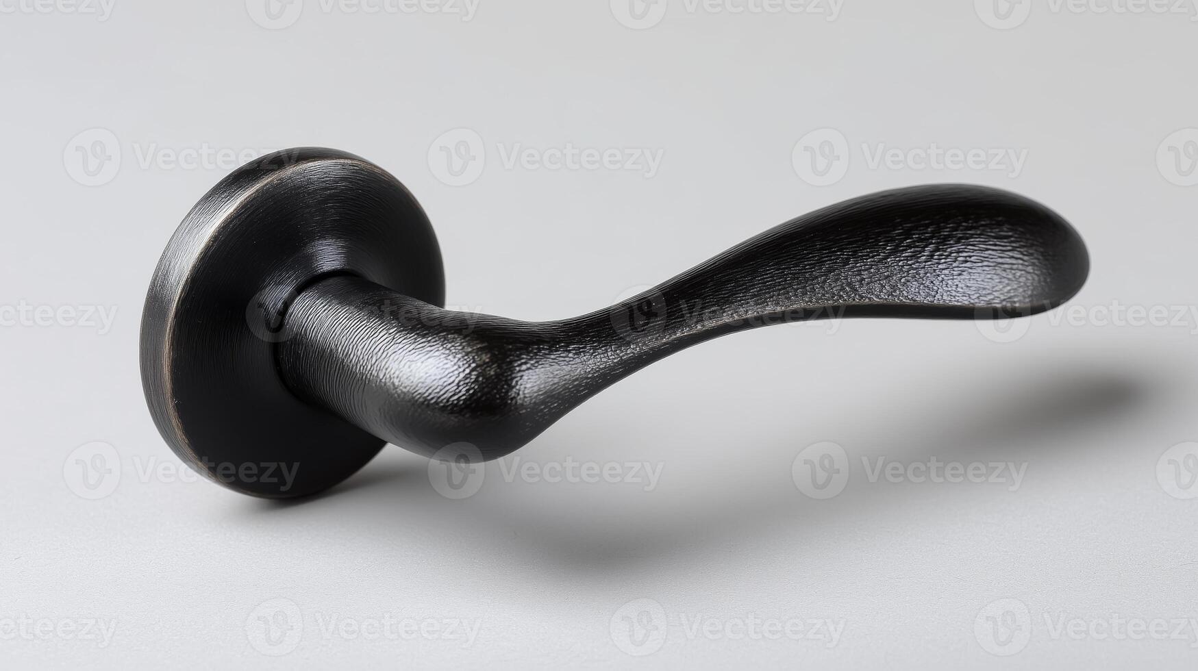 Black door handle showcasing sleek design and craftsmanship photo