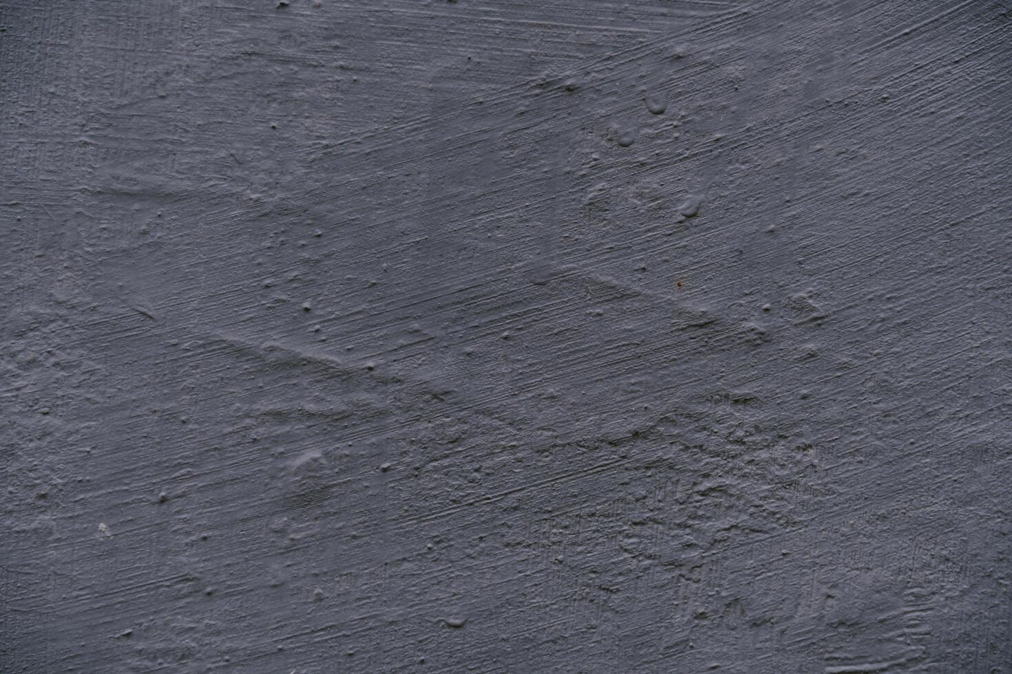 Light grey rough slate scratch background or texture. photo