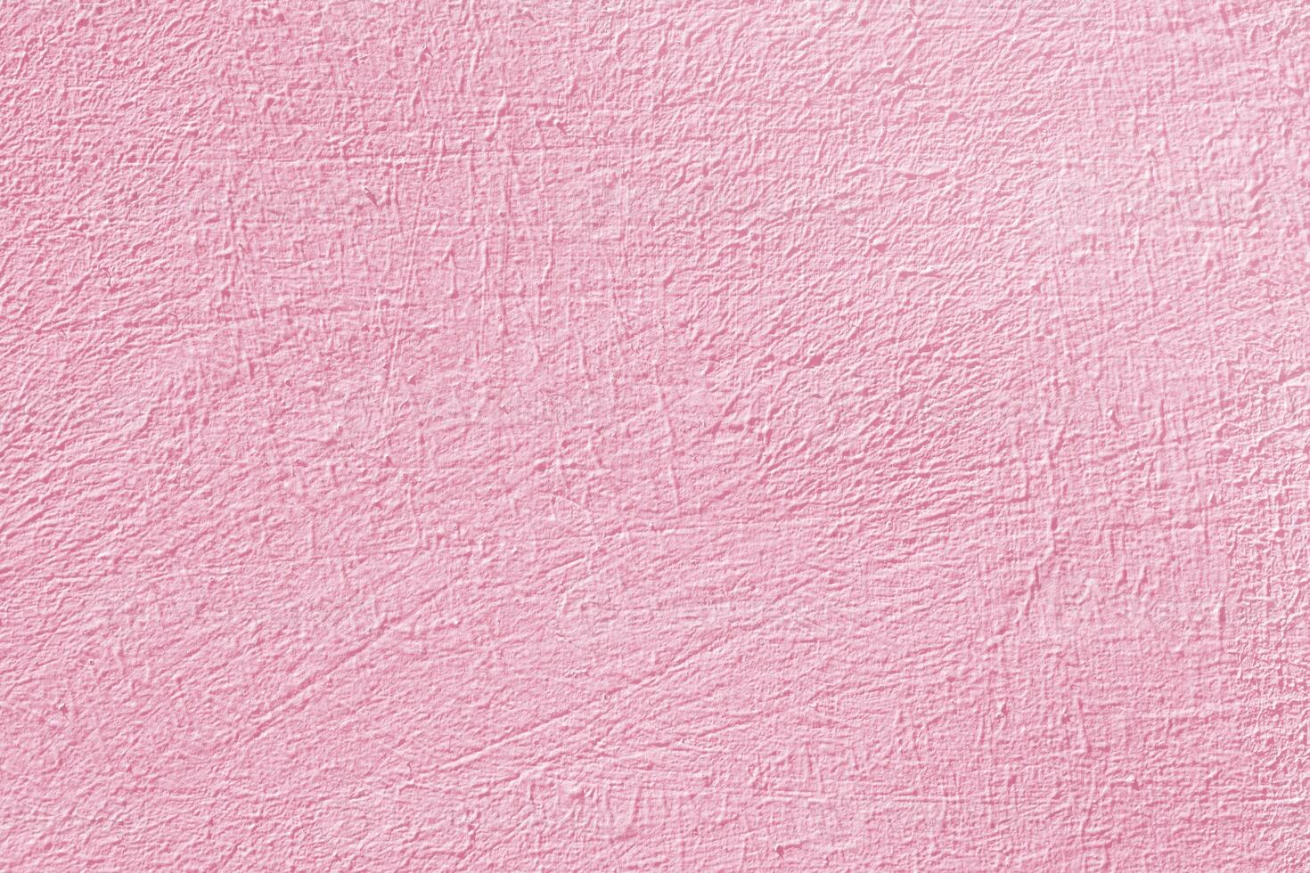 Pink stucco texture. Rough wall surface. Designer interior background. Abstract architectural surface. photo