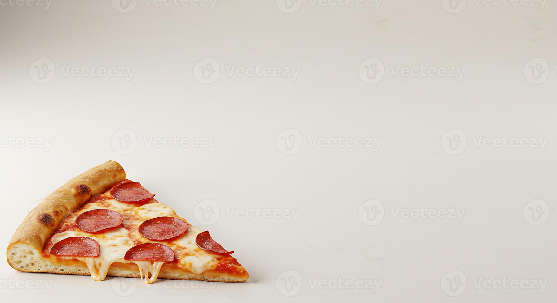 A slice of pizza on a white surface photo