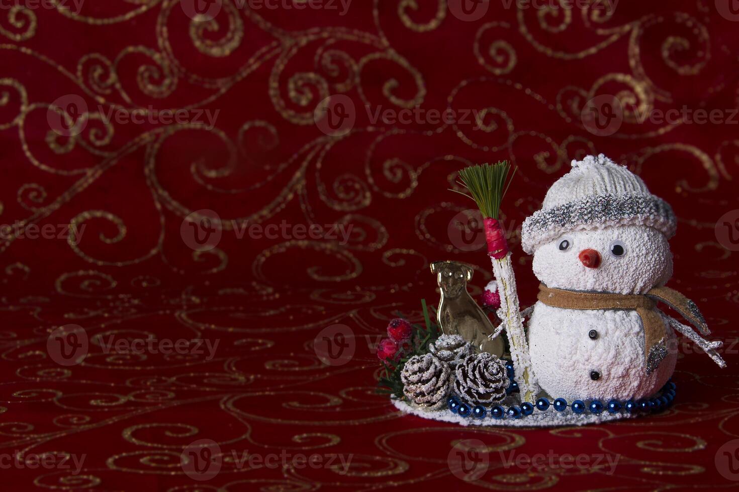 Toy snowman on bokeh background. New Year card. Christmas tree toy. Decoration for the holiday. photo