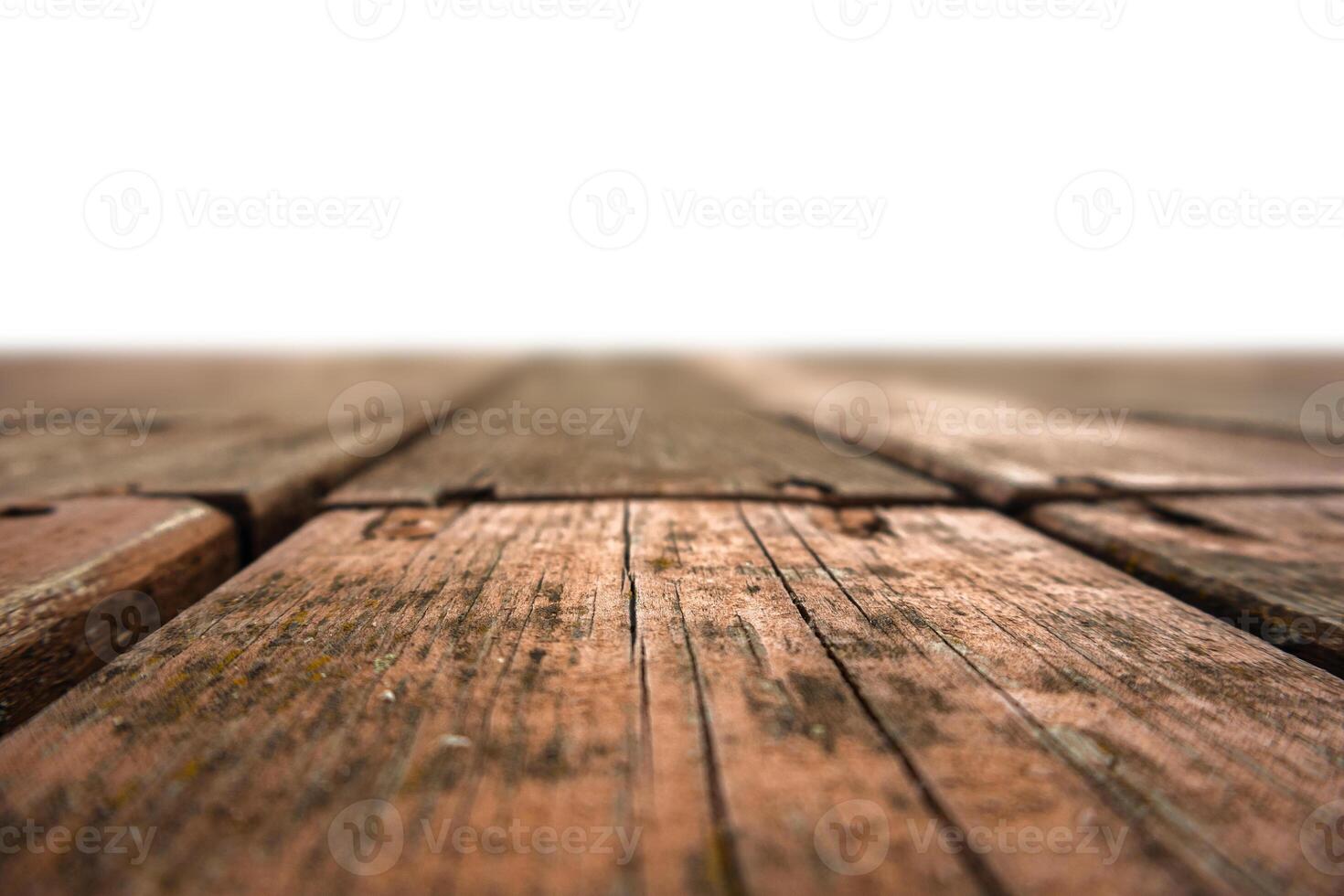 Wooden deck surface viewed from a low angle on a white background photo