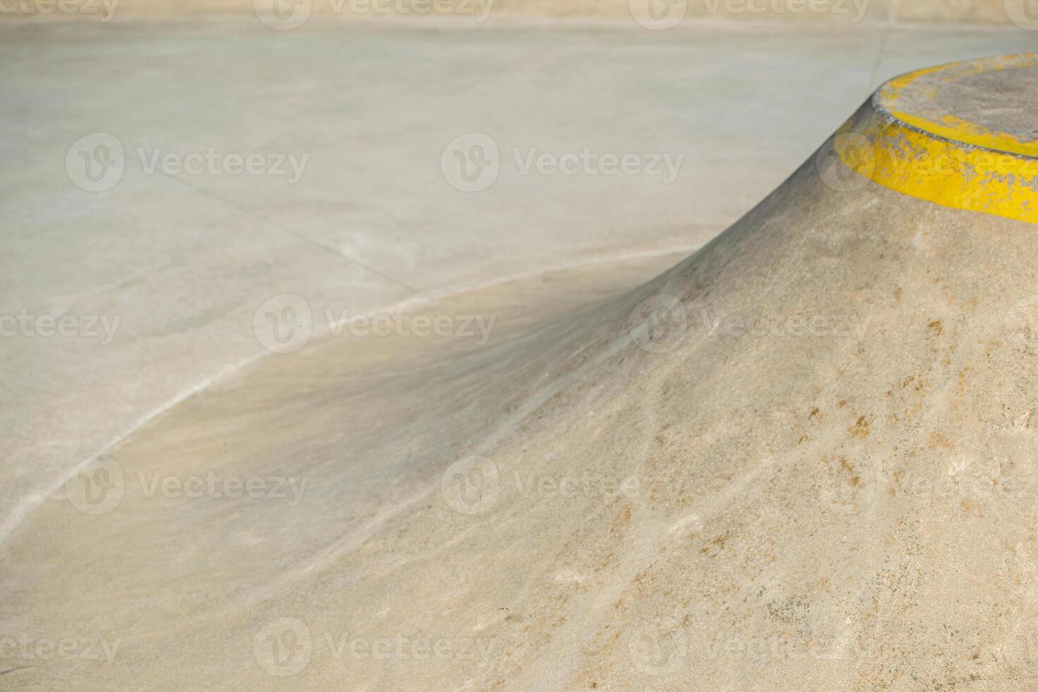 The Flowing Form of a Concrete Wave in a Skatepark. photo