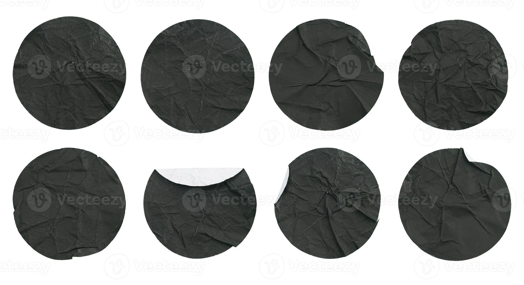 Set collection of blank crumpled black paper stickers in round shape isolated on white background photo