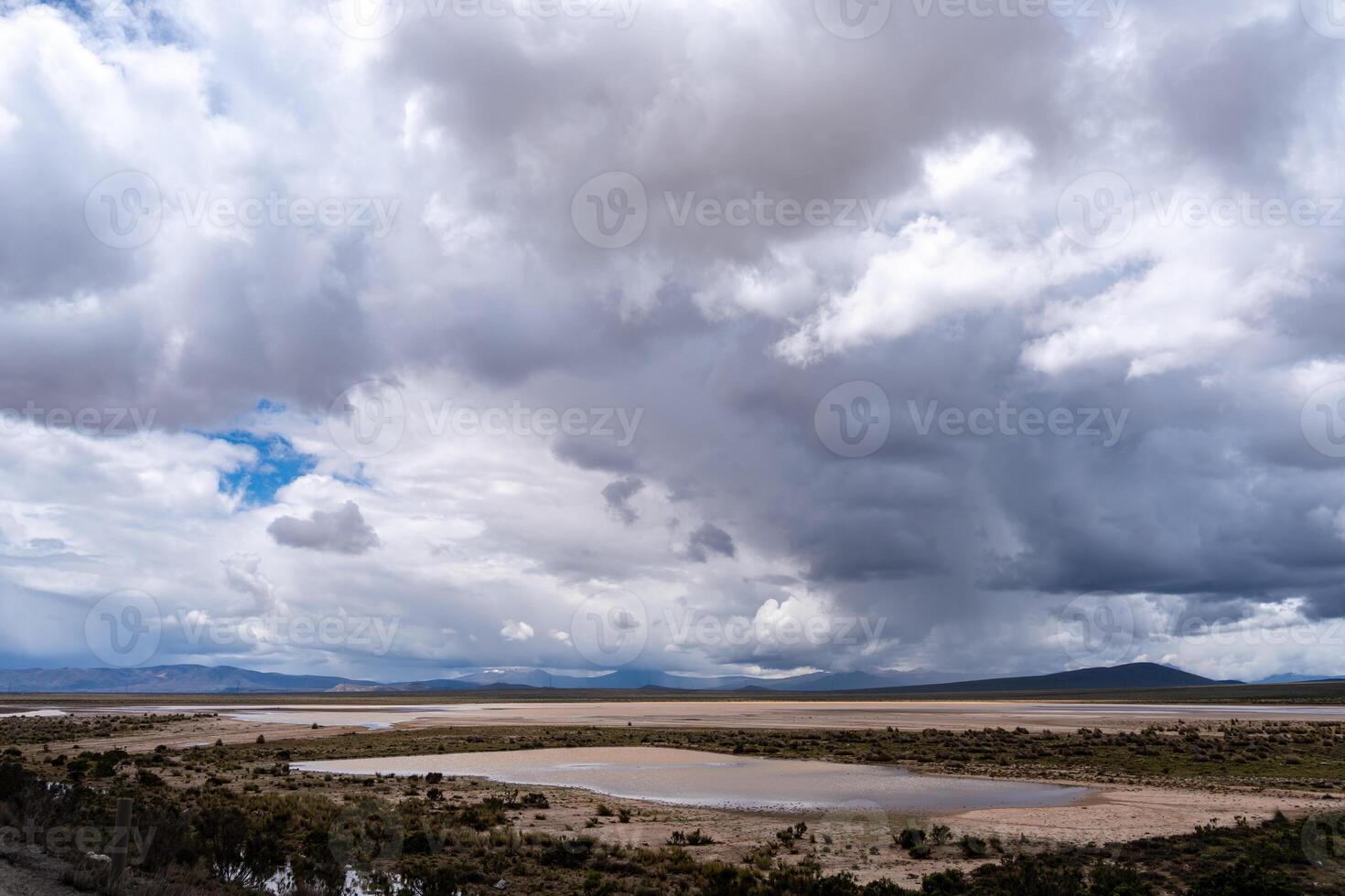 Vast valley and mountains landscape, with dramatic sky, Peru photo